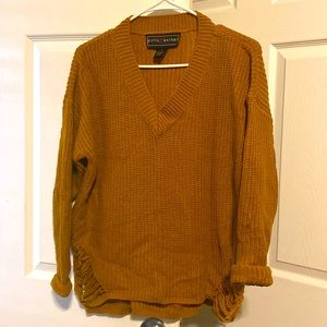 Gold sweater